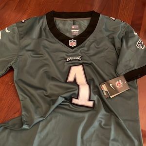 Authentic Jalen Hurts women’s NFL jersey. Never worn (too snug for me).
